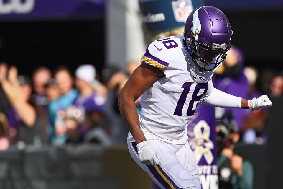 BALTIMORE, MARYLAND - NOVEMBER 07: Justin Jefferson #18 of the Minnesota Vikings celebrates after making a first quarter touchdown catch against the Baltimore Ravens at M&T Bank Stadium on November 07, 2021 in Baltimore, Maryland. (Photo by Todd Olszewski/Getty Images)