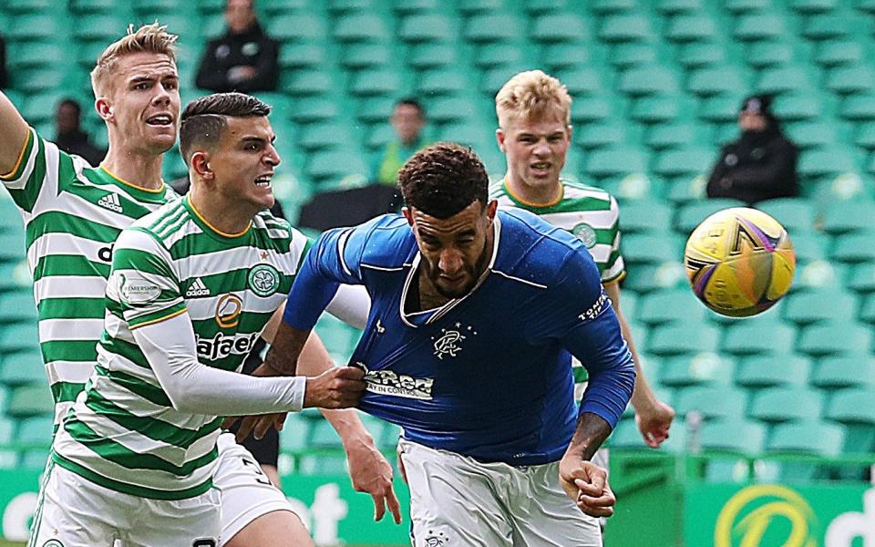 Conor Goldson scores the first of his two goals during Rangers 2-0 win over Celtic last weekend  - GETTY IMAGES