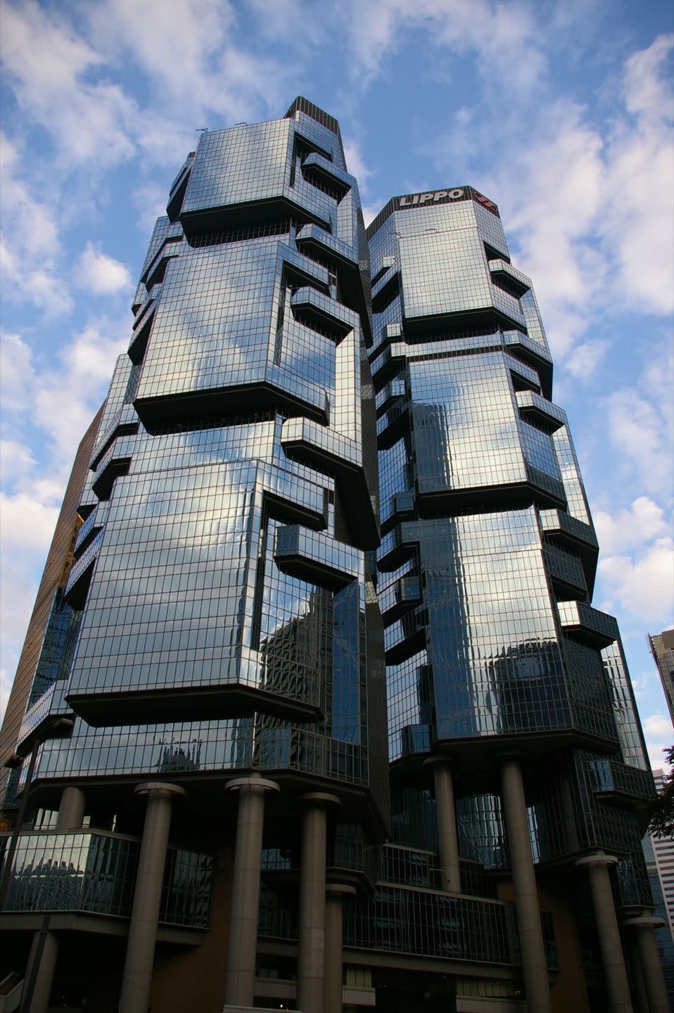 <p>The geometric twin skyscrapers in Hong Kong's Central District stretch upwards to 44 floors (564 feet) and 48 floors (610 feet) high, respectively.</p><p> Photo: Flickr/<a href="https://www.flickr.com/photos/arsene/368268641/in/photolist-yxtrk-4ds2Zm-5oKU1p-4do5mX-4do4fz-925BFy-yxuYh-44qr1u-8ZNFjQ-22qKoYe-6jDexz-9dGnFu-Ei7bVY-8JafG4-deBGJa-8D7kw-647cbV-auxMX5-22oU9FF-CMjyUR-4znx1c-99vzyp-99vAYk-99yNfE-99zxfo-99zB99-99yRoq-22G4jub-99yE8d-99yCQJ-99zuPs-asQ1Mw-he6ABd-4kX18V-ibxjg5-dLPxx2-78Mvri-V1eUoj-99wwPM-78MtSa-922XB8-7Xh5La-99vFQZ-99vKax-99ymwN-99vwt6-99yZEG-99yTgb-99v9v2-99yfEY" rel="nofollow noopener" target="_blank" data-ylk="slk:Arsene;elm:context_link;itc:0;sec:content-canvas" class="link ">Arsene</a></p>