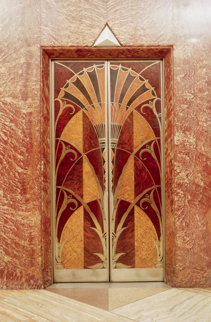 The doors of an elevator inside the Chrysler Building.