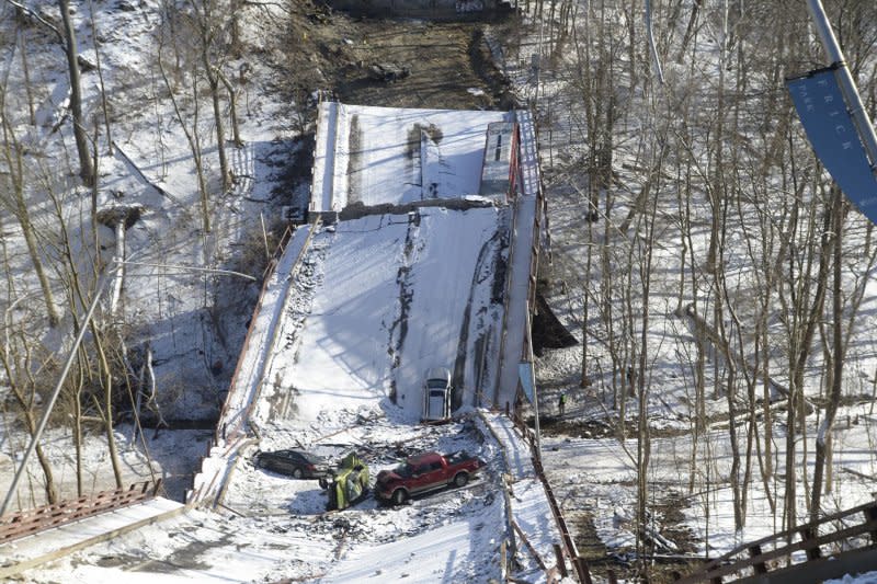 Five cars and one Port Authority bus can be seen from the Forbes Avenue side of the Fern Hollow Bridge that collapsed on January 28, 2022 in the Point Breeze neighborhood of Pittsburgh. In 2021, the American Society of Civil Engineers reported that more than 45,000 bridges were in poor condition. File Photo by Archie Carpenter/UPI