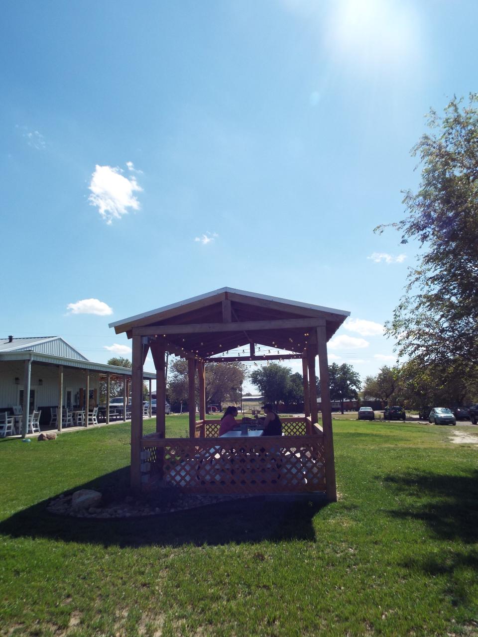 In the area out back of Creek House Honey Farm, a nice pergola offers a respite to families or couples in the large open spaces that seem miles away from the city but is really a short distance.