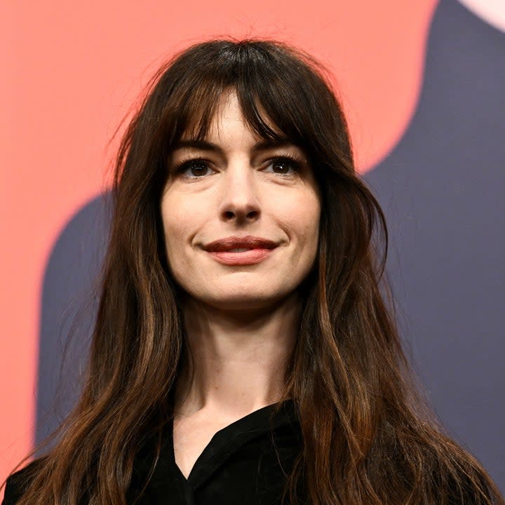 Anne Hathaway at a news conference