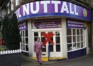 A supporter leaves the vandalised UKIP campaign office after their leader Paul Nuttall lost the Stoke Central by-election in Stoke on Trent, February 24, 2017. REUTERS/Darren Staples