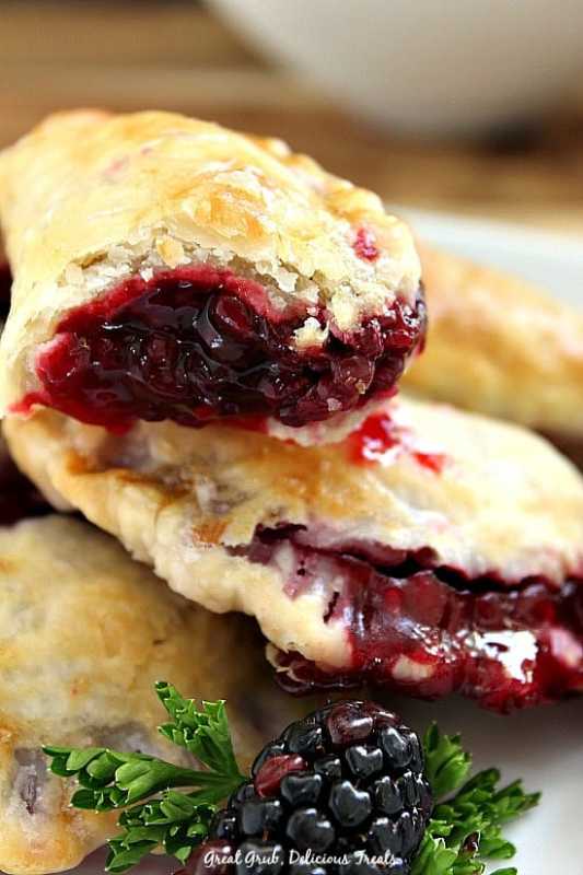<p>Great Grub, Delicious Treats</p><p>These blackberry hand pies have a flaky crust and are stuffed full with a fresh blackberry sauce, which is to die for, then baked to perfection.</p><p><strong>Get the recipe: <a href="https://www.greatgrubdelicioustreats.com/blackberry-hand-pies/" rel="nofollow noopener" target="_blank" data-ylk="slk:Blackberry Hand Pies;elm:context_link;itc:0;sec:content-canvas" class="link ">Blackberry Hand Pies</a></strong></p>