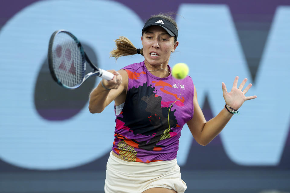 Jessica Pegula, of the United States, returns to Maria Sakkari, of Greece, during the WTA tennis tournament final match in Guadalajara, Mexico, Sunday, Oct. 23, 2022. (AP Photo/Refugio Ruiz)