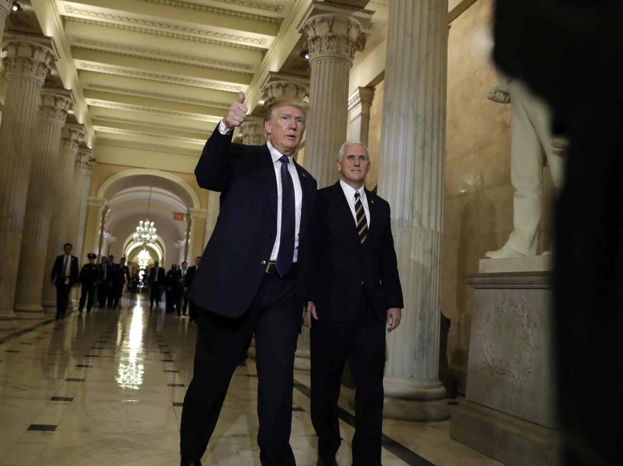 President Donald Trump leaves Capitol Hill after meeting with lawmakers on tax policy (AP Photo/Evan Vucci): AP