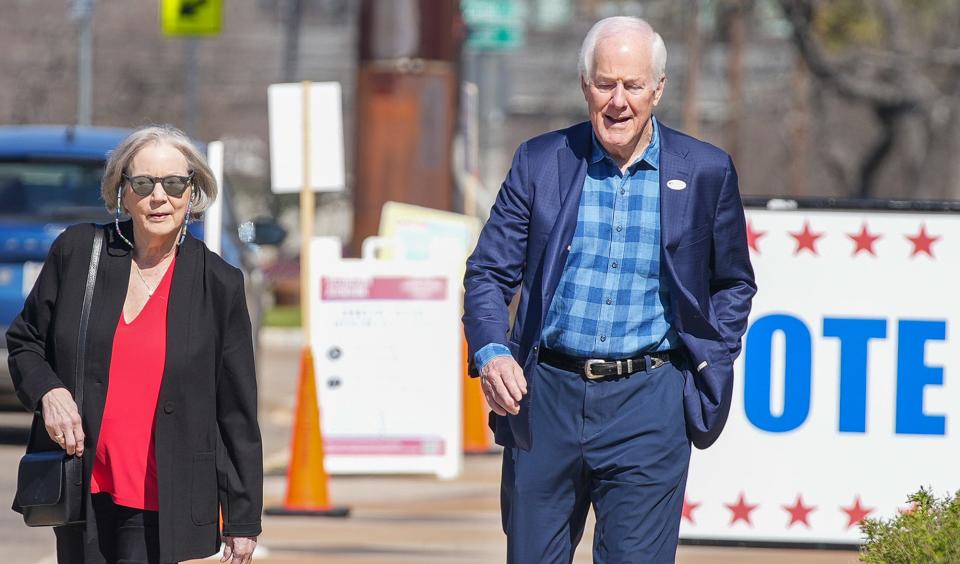 Sen. John Cornyn and wife Sandy voted Tuesday in East Austin. Speaking with reporters outside the polling place, Cornyn said he differed with former President Donald Trump on the importance of defending America's NATO allies.