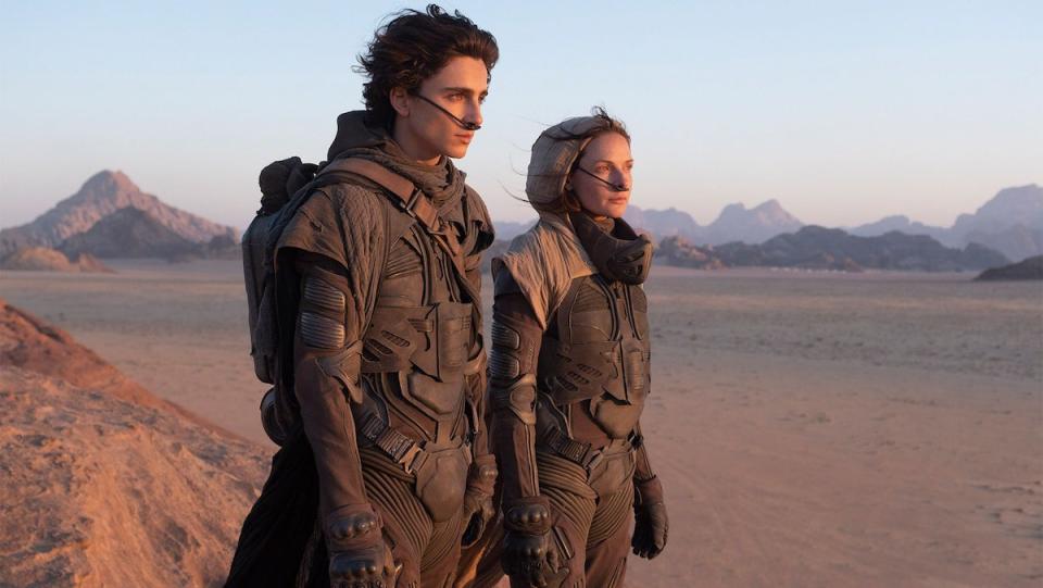 Paul and Lady Jessica stand in the desert in Dune