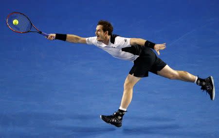 Britain's Andy Murray stretches for a shot during his semi-final match against Canada's Milos Raonic at the Australian Open tennis tournament at Melbourne Park, Australia, January 29, 2016. REUTERS/Jason Reed