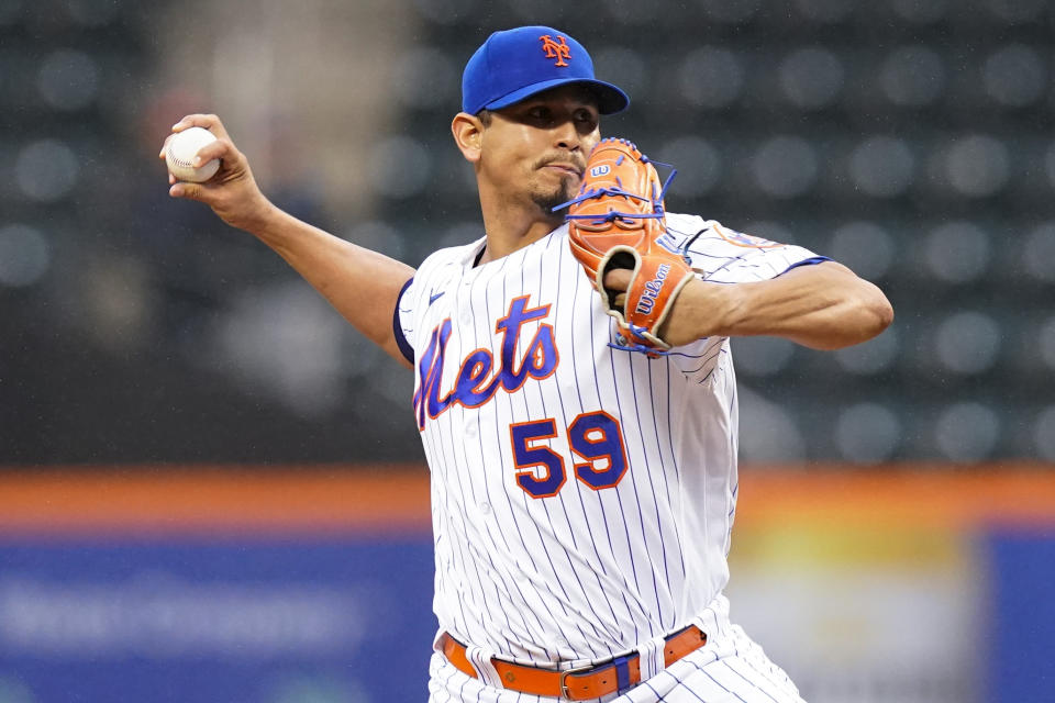 New York Mets' Carlos Carrasco pitches against the Washington Nationals during the first inning in the first baseball game of a doubleheader Tuesday, Oct. 4, 2022, in New York. (AP Photo/Frank Franklin II)