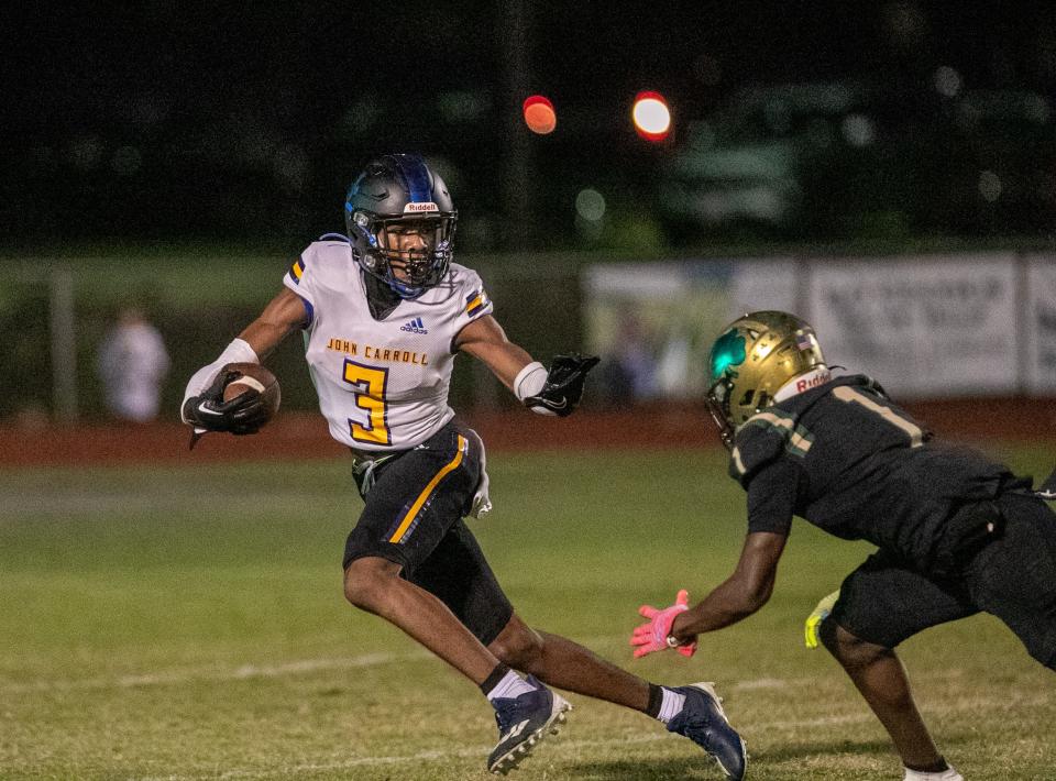 John Carroll Catholic Rams strong safety Robert Jones (3) with the return during the first half against Trinity Catholic at Trinity Catholic in Ocala, FL on Friday, December 2, 2022. [Cyndi Chambers/Ocala Star Banner] 2022