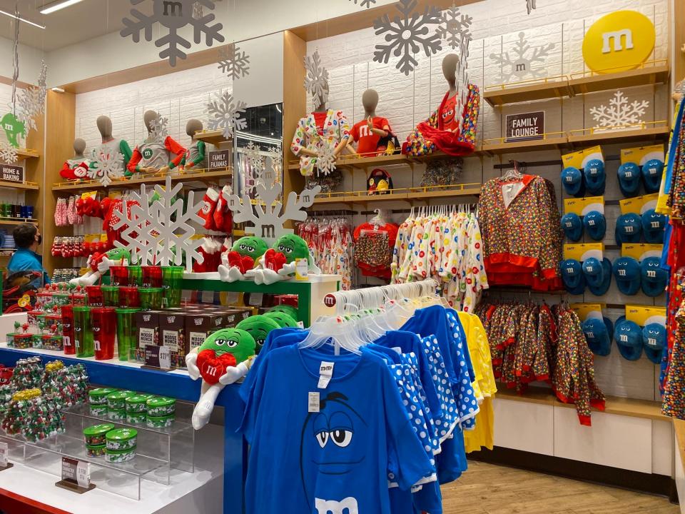 Holiday merchandise inside the Disney Springs M&M store.