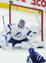 Toronto Maple Leafs defenseman Morgan Rielly (44) scores past Tampa Bay Lightning goaltender Andrei Vasilevskiy (88) during the second period of Game 7 in an NHL hockey first-round playoff series in Toronto, Saturday, May 14, 2022. (Nathan Denette/The Canadian Press via AP)