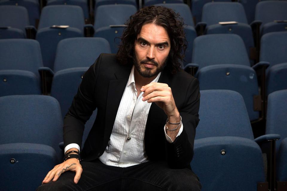 <p>Carl Court/Getty</p> Russell Brand