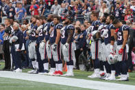 <p>The New England Patriots stand for the national anthem before the game against the Houston Texans at Gillette Stadium on September 9, 2018 in Foxborough, Massachusetts. (Photo by Jim Rogash/Getty Images) </p>