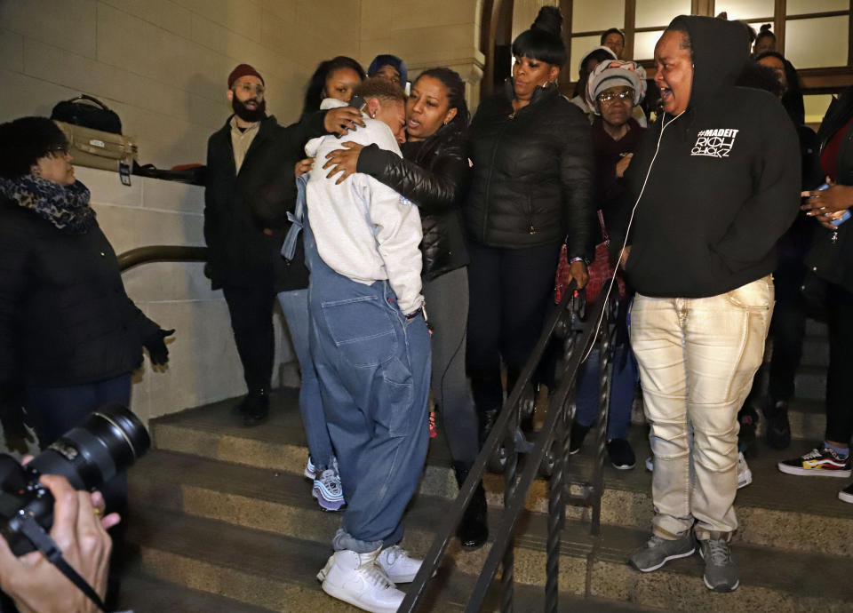 Supporters of Antwon Rose II, stand on the steps of Allegheny County Courthouse after hearing the verdict of not guilty on all charges for Michael Rosfeld, a former police officer in East Pittsburgh, Pa., Friday, March 22, 2019. Rosfeld was charged with homicide in the fatal shooting of Antwon Rose II as he fled during a traffic stop on June 19, 2018. (AP Photo/Gene J. Puskar)