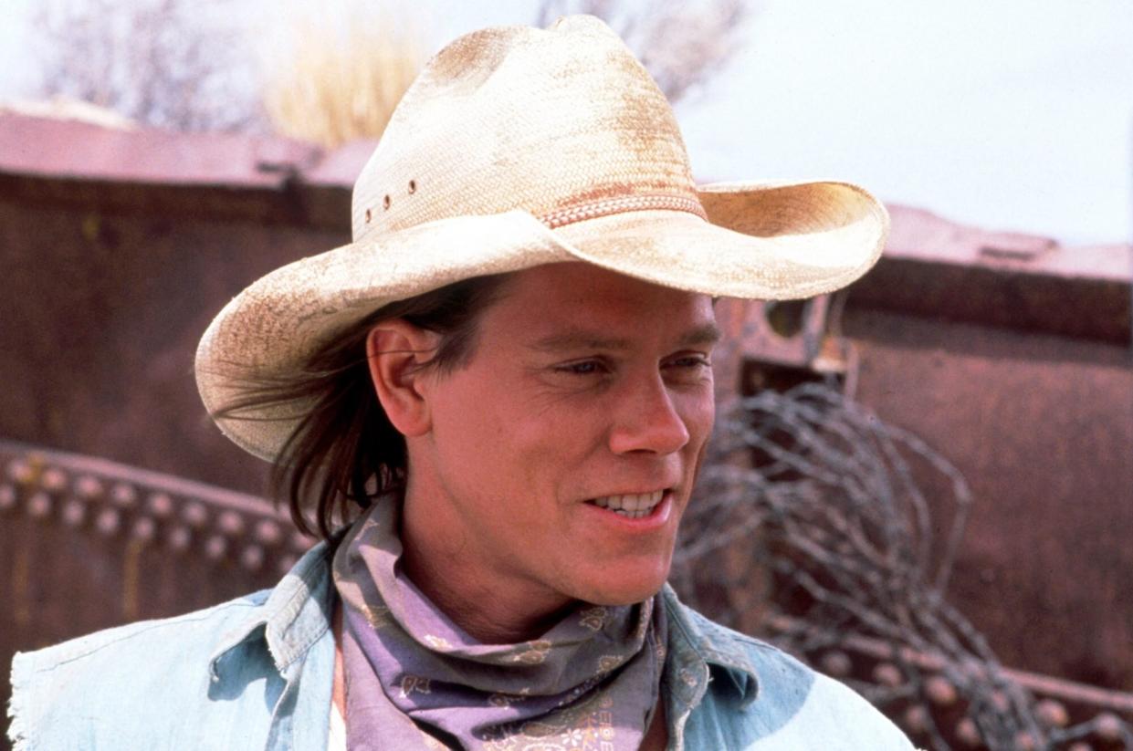 Editorial use only Mandatory Credit: Photo by Snap/Shutterstock (390847jg) FILM STILLS OF 'TREMORS' WITH 1990, KEVIN BACON, CLOTHING, COWBOY, DENIM SHIRT, HAT, SCARF IN 1990 VARIOUS