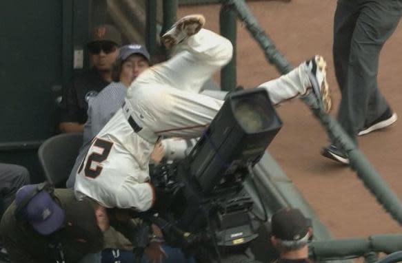 Conor Gillaspie dives into the camera well to make one of the best catches this season. (CSN Bay Area)