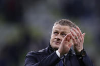 FILE - Manchester United's manager Ole Gunnar Solskjaer applauds fans after the Europa League final soccer match between Manchester United and Villarreal in Gdansk, Poland, Wednesday, May 26, 2021. Manchester United has fired Ole Gunnar Solskjaer after three years as manager after a fifth loss in seven Premier League games. United said a day after a 4-1 loss to Watford that “Ole will always be a legend at Manchester United and it is with regret that we have reached this difficult decision." (Kacper Pempel, Pool via AP, File)