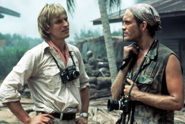 <p>Warner Brothers/Courtesy Everett</p> Julian Sands and John Malkovich in <em>The Killing Fields</em> (1984)