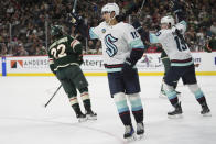 Seattle Kraken center Matty Beniers (10) celebrates after scoring against the Minnesota Wild during the second period of an NHL hockey game Thursday, April 18, 2024, in St. Paul, Minn. (AP Photo/Abbie Parr)