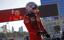 Ferrari driver Charles Leclerc of Monaco after taking pole position during the qualifying session at the Baku Formula One city circuit in Baku, Azerbaijan, Saturday, June 5, 2021. The Azerbaijan Formula One Grand Prix will take place on Sunday. (Maxim Shemetov, Pool via AP)