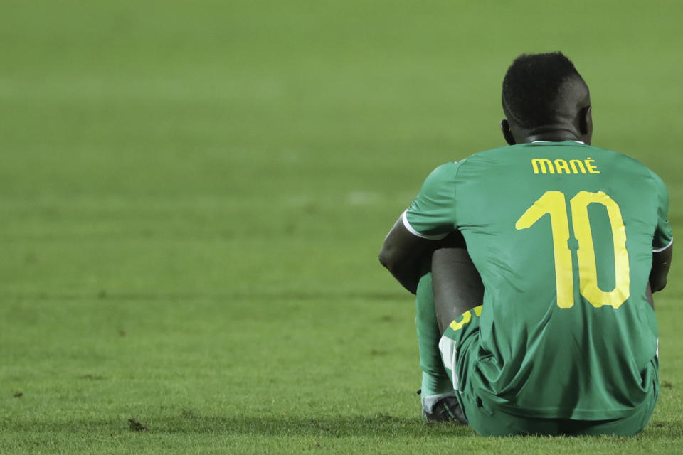 Senegal's Sadio Mane sets in dejection end the African Cup of Nations final soccer match between Algeria and Senegal in Cairo International stadium in Cairo, Egypt, Friday, July 19, 2019. Algeria won 1-0. (AP Photo/Hassan Ammar)