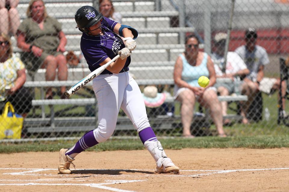 Arianna Exarchakis sends one over the fence for Monroe-Woodbury during a 13-2 victory over Corning in a NYSPHSAA Class AA softball regional semifinal May 30, 2023 at Union-Endicott.