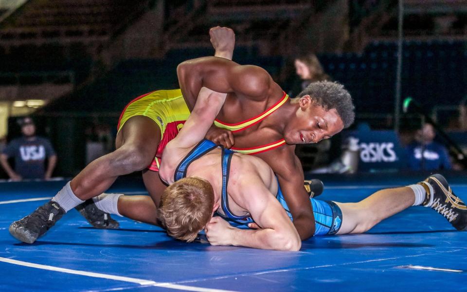 CVCA's Jordan Decatur (top) wins his second Fargo Cadet Freestyle National title with a technical fall win over Iowa's Brody Teske in the FargoDome in Fargo, N.D., on Friday.