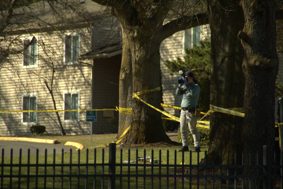 Tacoma Police Department personnel investigate a shooting at an apartment complex near Tacoma Community College on Wednesday, March 29, 2023 in the 1400 block of South Mildred Street. Police said a boy, 16, was killed.