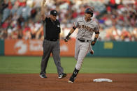 San Francisco Giants' Mauricio Dubon rounds the bases after a solo home run during the second inning of a baseball game against the Los Angeles Angels Tuesday, June 22, 2021, in Anaheim, Calif. (AP Photo/Marcio Jose Sanchez)