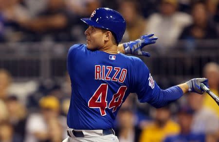 Chicago Cubs first baseman Anthony Rizzo (44) hits a sacrifice fly RBI against the Pittsburgh Pirates during the twelfth inning at PNC Park. Charles LeClaire-USA TODAY Sports