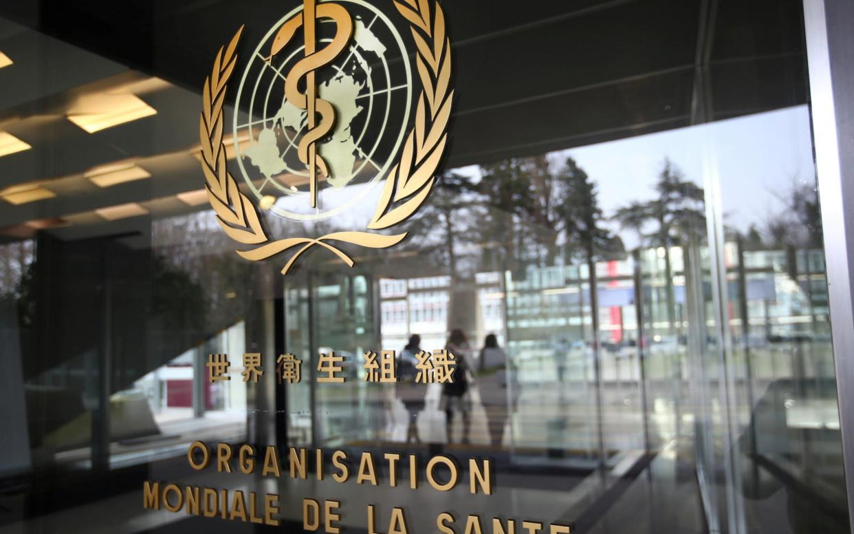 A logo is pictured outside a building of the World Health Organization (WHO) - Denis Balibouse / REUTERS