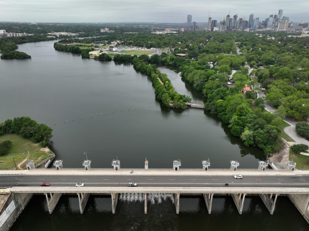 This area of Lady Bird Lake next to Longhorn Dam, photographed Friday, will be the site of a wishbone-shaped pedestrian and bicycle bridge that will connect the Butler Hike and Bike Trail at three points: Longhorn Shores, Canterbury Park and a peninsula near Holly Shores.