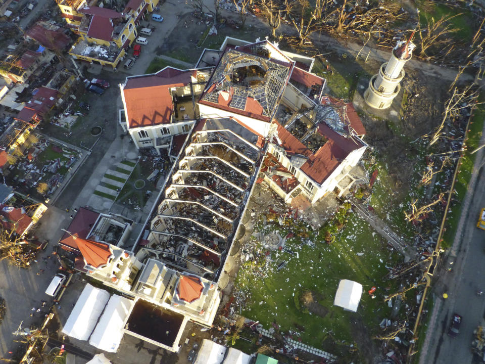 An aerial picture taken with a micro-drone camera shows the roofless Metropolitan Cathedral of the Archdiocese of Palo in an area devastated by Typhoon Haiyan, near Tacloban in central Philippines, Nov. 16, 2013. (Reuters/ISAR-Germany)