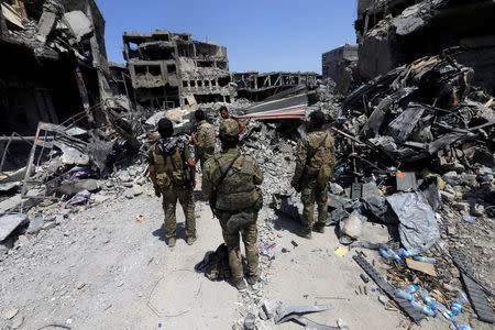 Members of the Emergency Response Division are seen in the Old City of Mosul, Iraq July 9, 2017. REUTERS/Alaa Al-Marjani