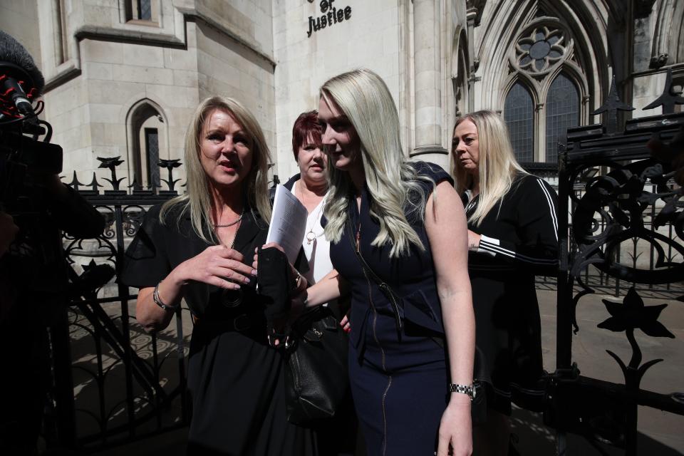 Former post office worker Janet Skinner (left) celebratesPA