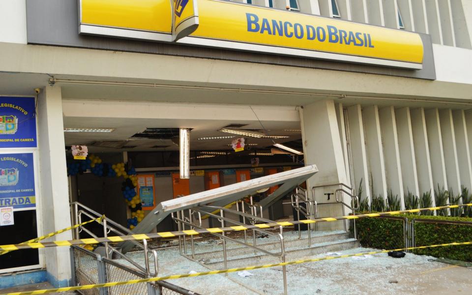 The bank that was broken into in Cameta, with the front of the building blown off - AFP