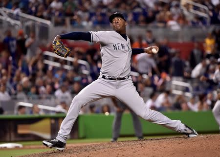 Aug 21, 2018; Miami, FL, USA; New York Yankees relief pitcher Aroldis Chapman (54) delivers a pitch in the twelfth inning against the Miami Marlins at Marlins Park. Mandatory Credit: Steve Mitchell-USA TODAY Sports