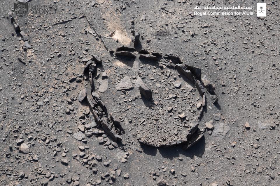 A more distant aerial view of a stone circle