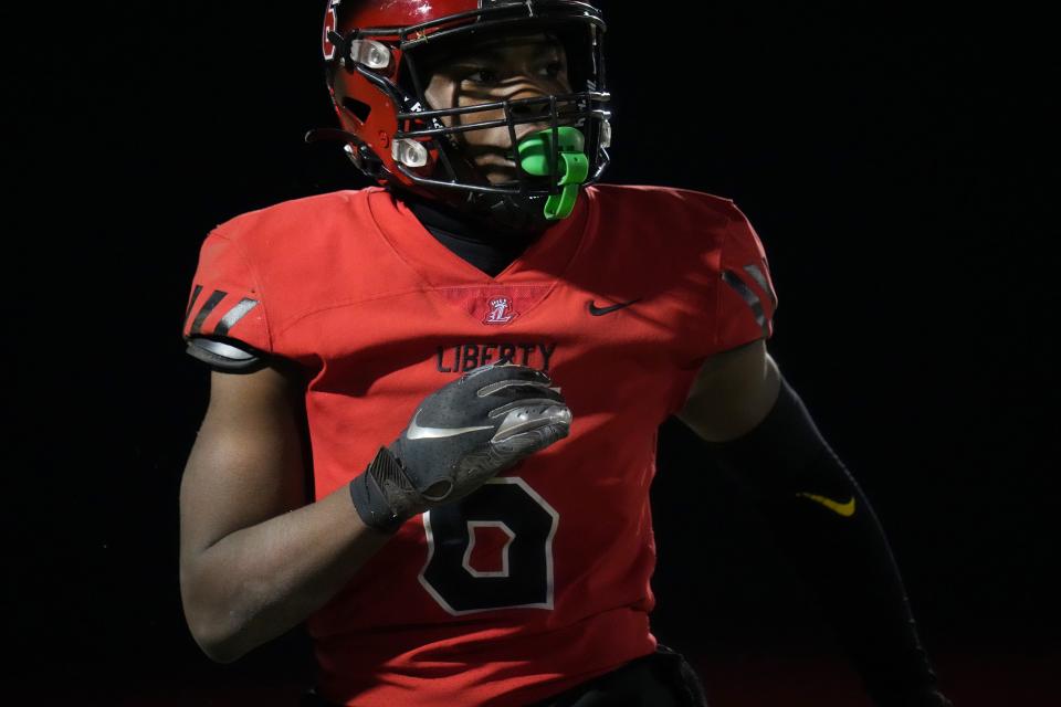 Liberty Lions receiver Prince Zombo (6) takes the field against the Sandra Day O’Connor Eagles during their open division playoff game on Friday, Nov. 25, 2022. 