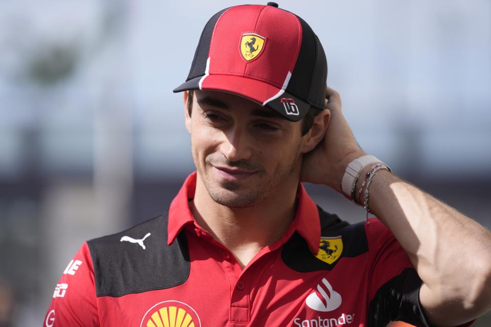 Ferrari's Monegasque driver Charles Leclerc arrives at the Yas Marina racetrack in Abu Dhabi, United Arab Emirates, Thursday, Nov. 23, 2023. (AP Photo/Kamran Jebreili)