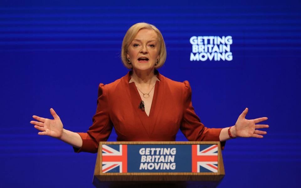 Liz Truss is pictured during her speech at Conservative Party conference in Birmingham today - Isabel Infantes/Shutterstock