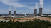 The four nuclear reactors and cooling towers are seen at the Alvin W. Vogtle Electric Generating Plant, Friday, May 31, 2024, in Waynesboro, Ga. (AP Photo/Mike Stewart)