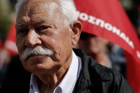 A Greek pensioner takes part in a demonstration against planned pension cuts in Athens, Greece, October 3, 2017. REUTERS/Alkis Konstantinidis