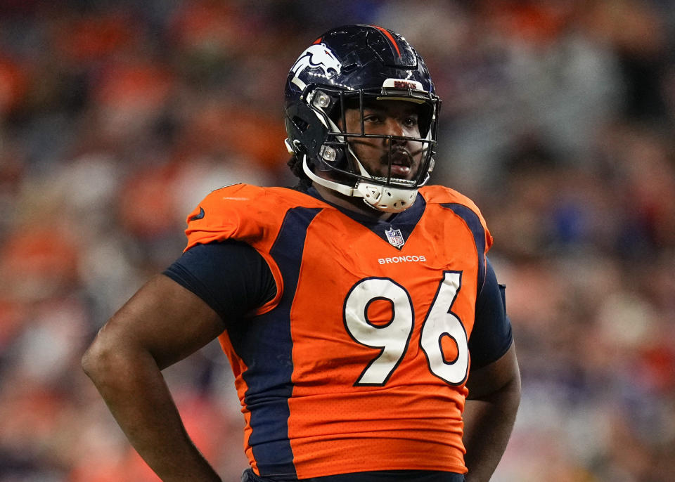 Denver Broncos defensive end Eyioma Uwazurike (96) looks on against the <a class="link " href="https://sports.yahoo.com/nfl/teams/minnesota/" data-i13n="sec:content-canvas;subsec:anchor_text;elm:context_link" data-ylk="slk:Minnesota Vikings;sec:content-canvas;subsec:anchor_text;elm:context_link;itc:0">Minnesota Vikings</a> during an NFL preseason football game, Saturday, Aug. 27, 2022, in Denver. (AP Photo/Jack Dempsey)