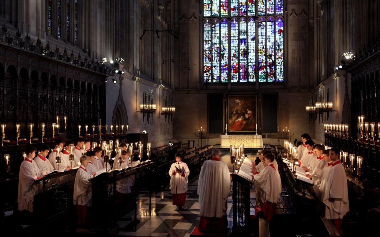 Choir of King's College Cambridge conduct a rehearsal of their Christmas Eve service of 'A Festival of Nine Lessons and Carols' in King's College Chapel