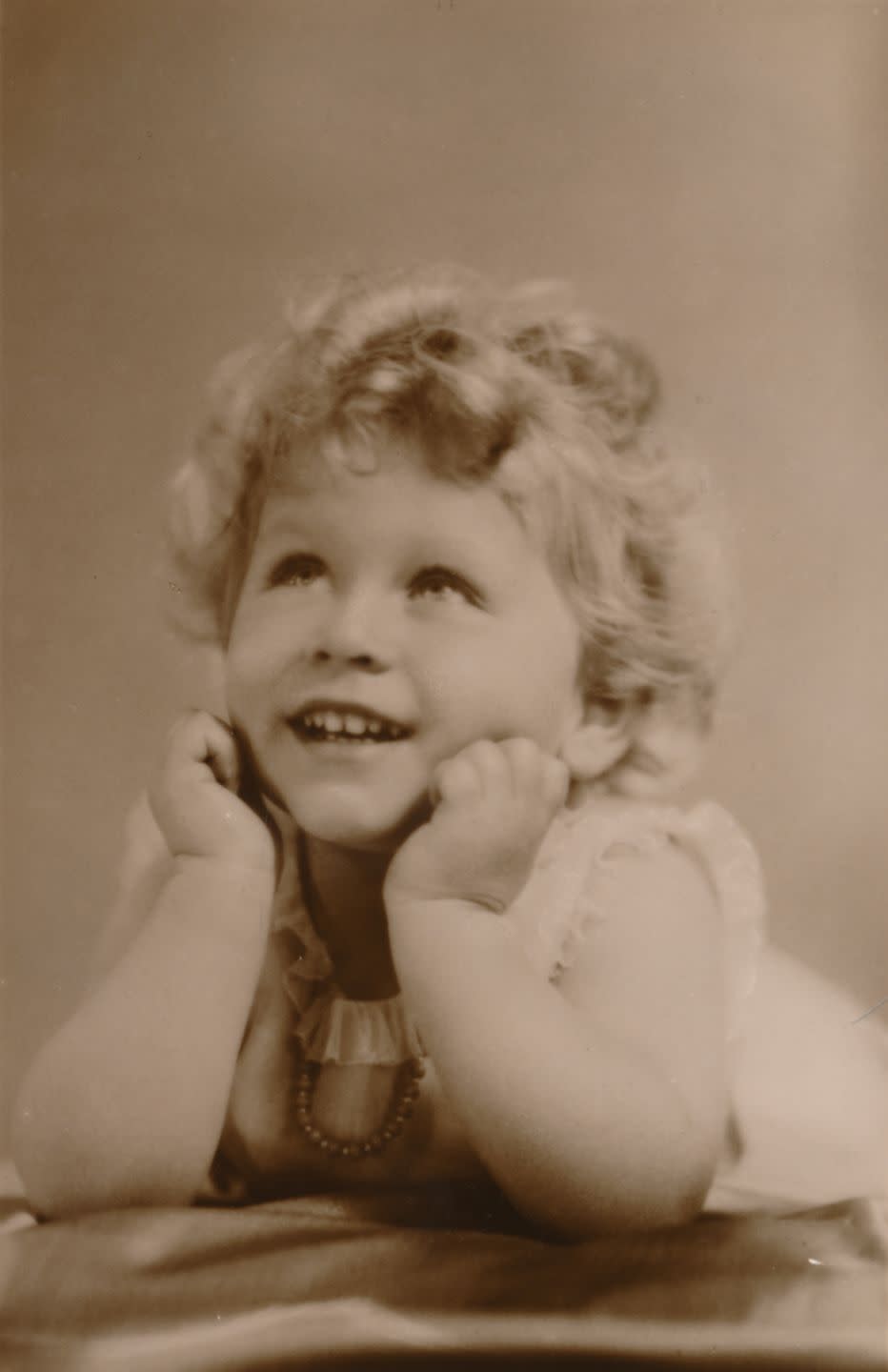 <p>Princess Elizabeth, now Queen Elizabeth II, is all smiles in this portrait from 1929, when she was only 3 years old.</p>