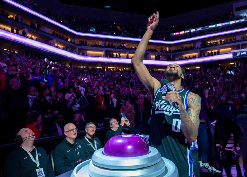 Sacramento Kings Malik Monk point to the sky after light the beam during the Kings 131-129 win over the San Antonio Spurs at Golden 1 Center on Thursday, March 7, 2024 in Sacramento.